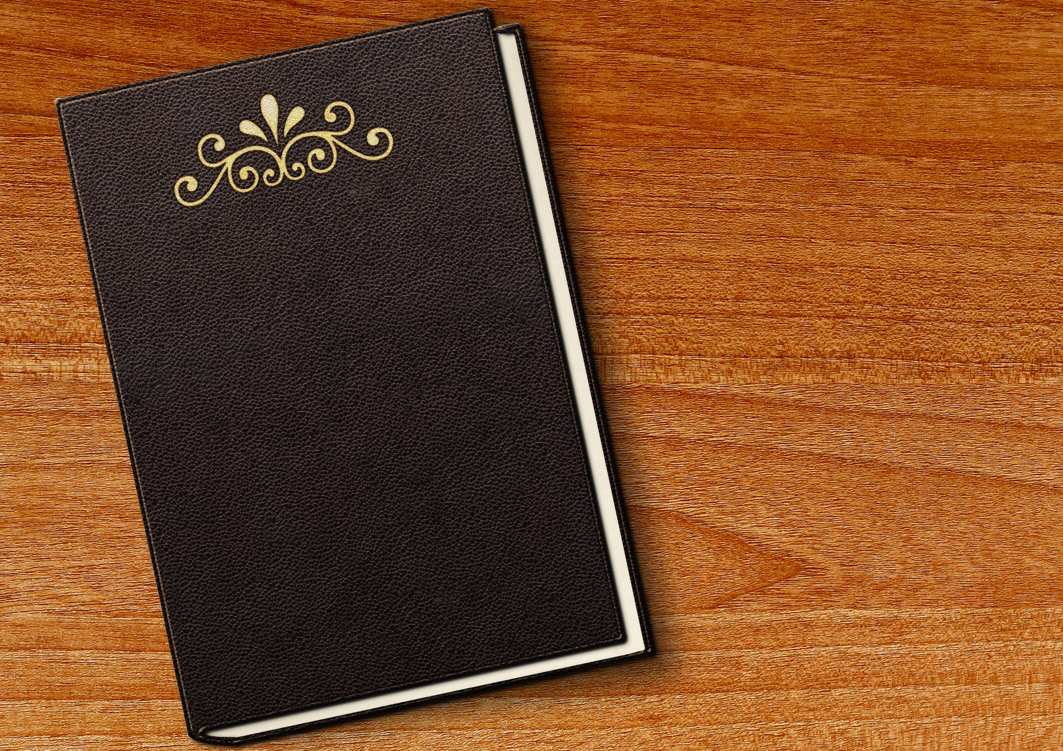 Black Book With Blank Cover On Wooden Background